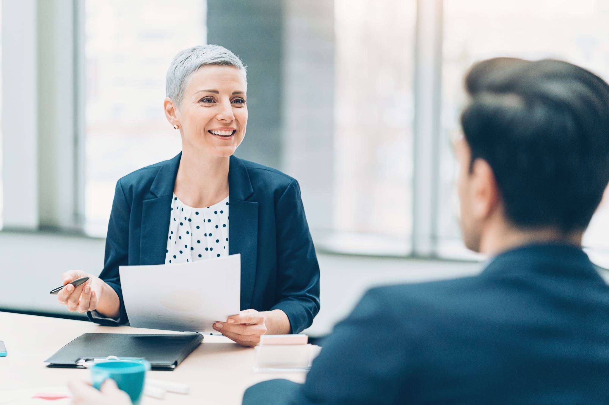 Two-business-people-communicating