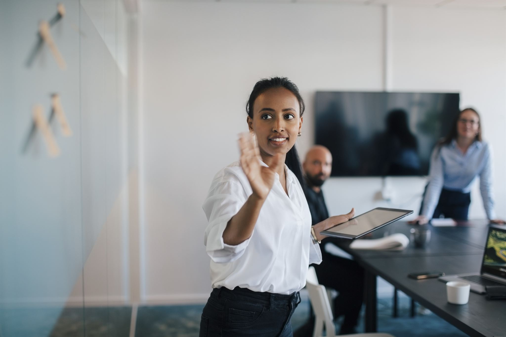 Woman-standing-in-conference-room